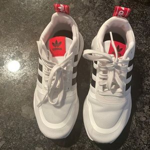 Adidas tennis shoes.